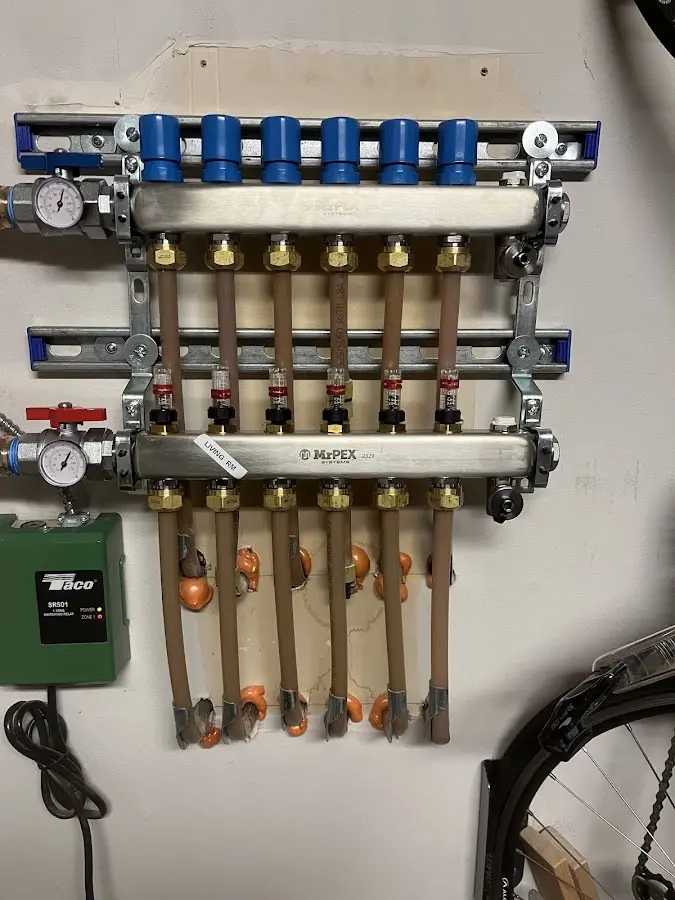 Plumber performing Water Heater Repair at a residential property in Caruthersville